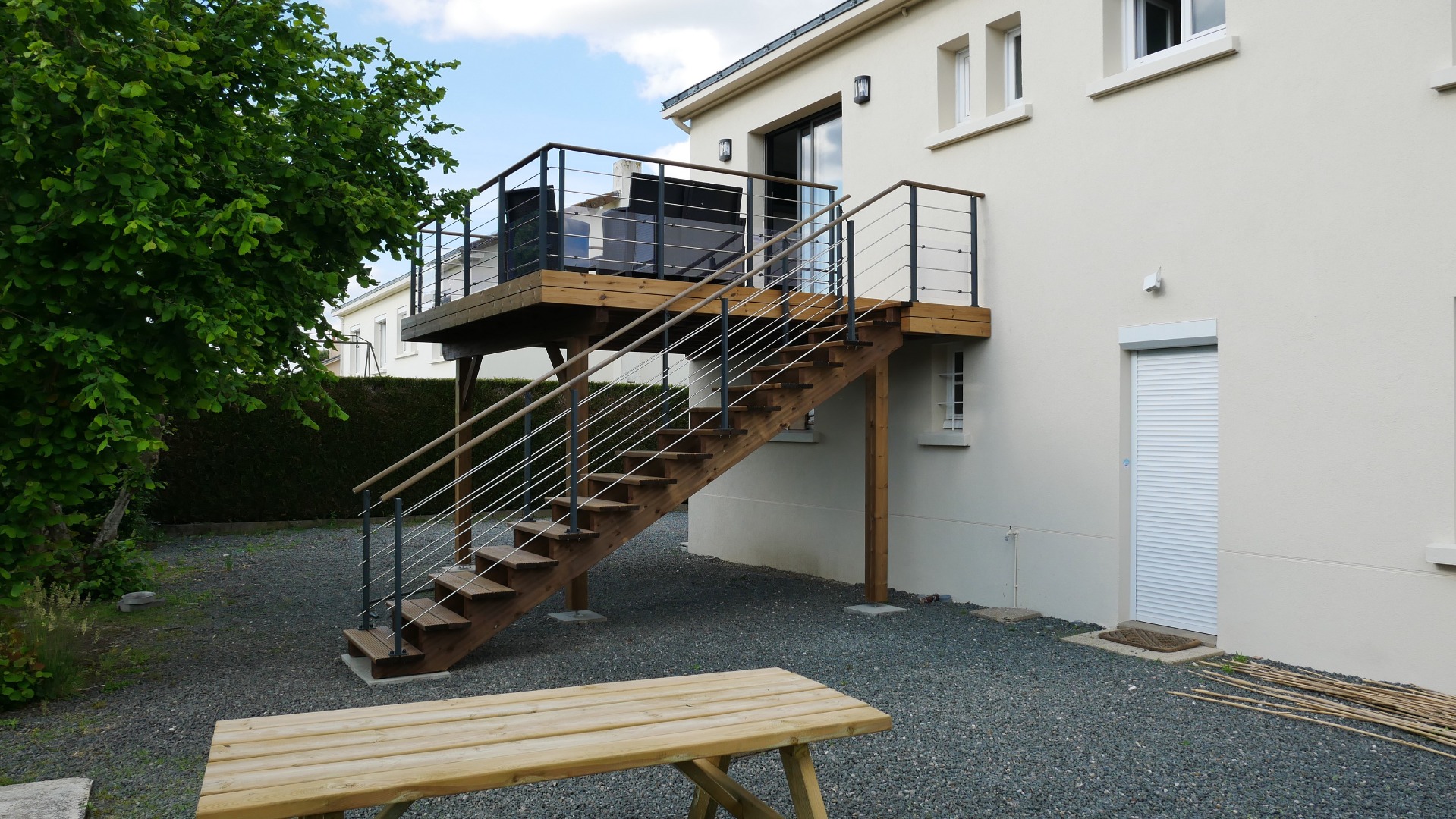 Terrasse sur poteaux à Montbert